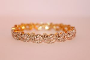 Modern Indian woman wearing everyday fine diamond jewelry