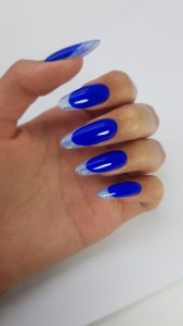 Margarita Yutsaytis bright nails polshed