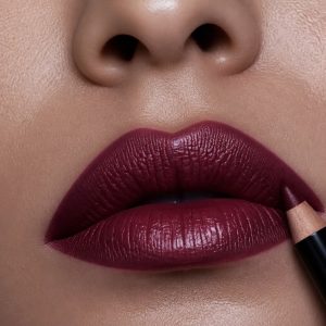 Burgundy lip for winter makeup trends 2026