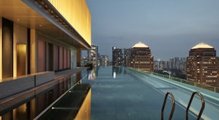 Como Hotels and Resorts Infinity pool at dusk