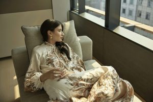 Woman lodging at window in Singapore's sleep touism  